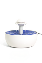Round Cat water Fountain -Automatic Water fountain in Qatar .smooth  water falling quite and modern design side view 